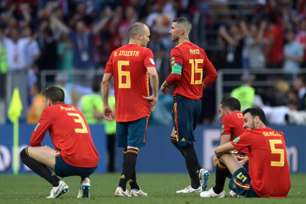 Spain's defender Sergio Ramos (3L) and teammates react to missing two shots during the penalty shootout of the Russia 2018 World Cup round of 16 football match between Spain and Russia at the Luzhniki Stadium in Moscow on July 1, 2018. (Photo by Juan Mabromata / AFP) / RESTRICTED TO EDITORIAL USE - NO MOBILE PUSH ALERTS/DOWNLOADS        (Photo credit should read JUAN MABROMATA/AFP/Getty Images)