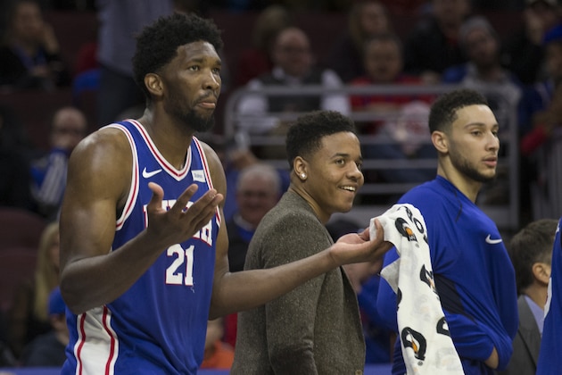 PHILADELPHIA, PA - NOVEMBER 22: Joel Embiid #21, Markelle Fultz #20, and Ben Simmons #25 of the Philadelphia 76ers react from the bench against the Portland Trail Blazers at the Wells Fargo Center on November 22, 2017 in Philadelphia, Pennsylvania. NOTE TO USER: User expressly acknowledges and agrees that, by downloading and or using this photograph, User is consenting to the terms and conditions of the Getty Images License Agreement. (Photo by Mitchell Leff/Getty Images)