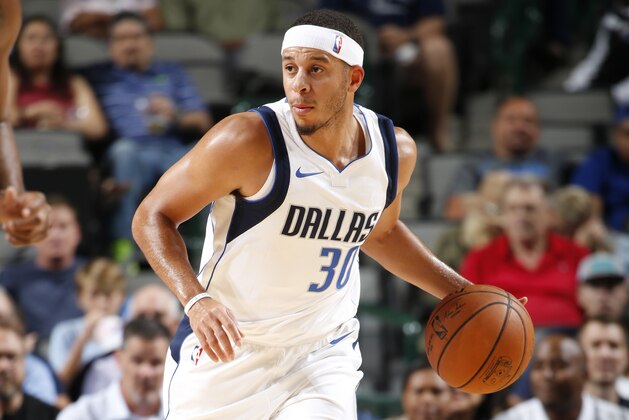 DALLAS, TX - OCTOBER 2:  Seth Curry #30 of the Dallas Mavericks handles the ball against the Milwaukee Bucks during the preseason game on October 2, 2017 at the American Airlines Center in Dallas, Texas. NOTE TO USER: User expressly acknowledges and agrees that, by downloading and or using this photograph, User is consenting to the terms and conditions of the Getty Images License Agreement. Mandatory Copyright Notice: Copyright 2017 NBAE (Photo by Glenn James/NBAE via Getty Images)