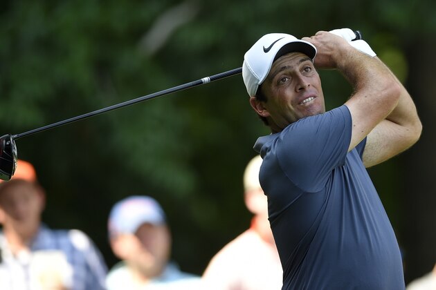 Francesco Molinari, of Italy, watches his tee shot on the eighth tee during the final round of the Quicken Loans National golf tournament, Sunday, July 1, 2018, in Potomac, Md. (AP Photo/Nick Wass)