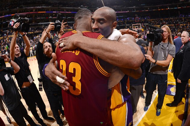 LOS ANGELES, CA - MARCH 10: Kobe Bryant #24 of the Los Angeles Lakers shares a hug with LeBron James #23 of the Cleveland Cavaliers after the game on March 10, 2016 at STAPLES Center in Los Angeles, California. NOTE TO USER: User expressly acknowledges and agrees that, by downloading and/or using this Photograph, user is consenting to the terms and conditions of the Getty Images License Agreement. Mandatory Copyright Notice: Copyright 2016 NBAE (Photo by Noah Graham/NBAE via Getty Images)