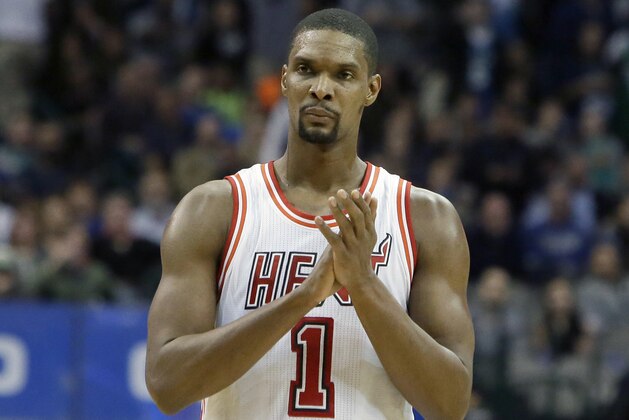 FILE - In this Feb. 3, 2016, file photo, Miami Heat forward Chris Bosh (1) reacts to a call during the second half of an NBA basketball game against the Dallas Mavericks, in Dallas. Bosh was dealing with more than one blood clot earlier this year, and said Wednesday, Sept. 21, 2016,  that he felt written off when Miami Heat team doctors advised him that the situation would likely be career-ending. (AP Photo/LM Otero, File)