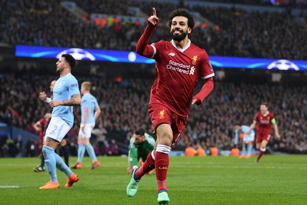 MANCHESTER, ENGLAND - APRIL 10:  Mohamed Salah of Liverpool celebrates scoring the first goal during the Quarter Final Second Leg match between Manchester City and Liverpool at Etihad Stadium on April 10, 2018 in Manchester, England.  (Photo by Laurence Griffiths/Getty Images,)