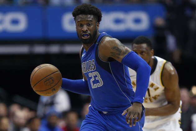 Dallas Mavericks guard Wesley Matthews (23) brings the ball up against the Indiana Pacers during the second half of an NBA basketball game, Monday, Feb. 26, 2018, in Dallas. The Mavericks won 109-103. (AP Photo/Ron Jenkins)