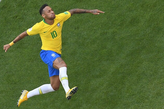 Brazil's forward Neymar celebrates scoring the opening goal during the Russia 2018 World Cup round of 16 football match between Brazil and Mexico at the Samara Arena in Samara on July 2, 2018. (Photo by Kirill KUDRYAVTSEV / AFP) / RESTRICTED TO EDITORIAL USE - NO MOBILE PUSH ALERTS/DOWNLOADS        (Photo credit should read KIRILL KUDRYAVTSEV/AFP/Getty Images)