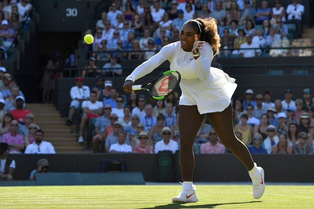 US player Serena Williams returns against Netherlands' Arantxa Rus during their women's singles first round match on the first day of the 2018 Wimbledon Championships at The All England Lawn Tennis Club in Wimbledon, southwest London, on July 2, 2018. (Photo by Ben STANSALL / AFP) / RESTRICTED TO EDITORIAL USE        (Photo credit should read BEN STANSALL/AFP/Getty Images)