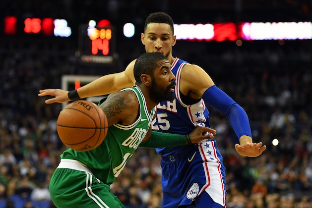 LONDON, ENGLAND - JANUARY 11:  Kyrie Irving #11 of the Boston Celtics holds off Ben Simmons #25 of the Philadelphia 76ers during the NBA game between Boston Celtics and Philadelphia 76ers at The O2 Arena on January 11, 2018 in London, England. (Photo by Dan Mullan/Getty Images)