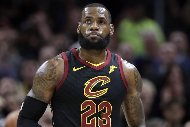 Cleveland Cavaliers' LeBron James looks up at the scoreboard during the first half against the Golden State Warriors in Game 3 of basketball's NBA Finals, Wednesday, June 6, 2018, in Cleveland. (AP Photo/Tony Dejak)