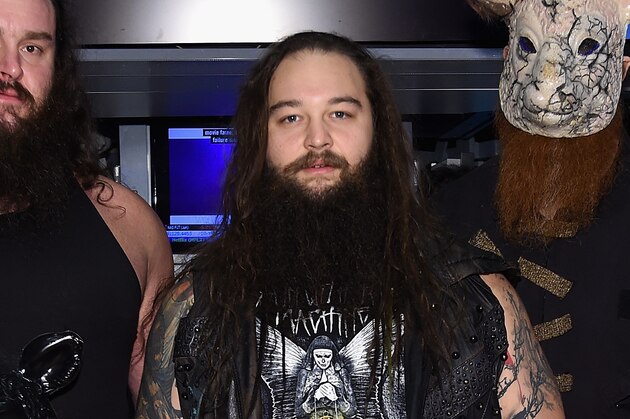 NEW YORK, NY - MARCH 29:  WWE Superstars Braun Strowman, Bray Wyatt and Erick Rowan ring The New York Stock Exchange Opening Bell in honor of WrestleMania 32  at New York Stock Exchange on March 29, 2016 in New York City.  (Photo by Jamie McCarthy/Getty Images)