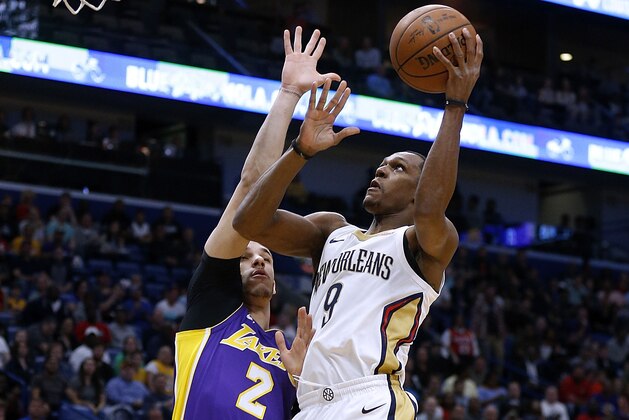 NEW ORLEANS, LA - MARCH 22: Rajon Rondo #9 of the New Orleans Pelicans shoots against Lonzo Ball #2 of the Los Angeles Lakers during the first half at the Smoothie King Center on March 22, 2018 in New Orleans, Louisiana. NOTE TO USER: User expressly acknowledges and agrees that, by downloading and or using this photograph, User is consenting to the terms and conditions of the Getty Images License Agreement.  (Photo by Jonathan Bachman/Getty Images)