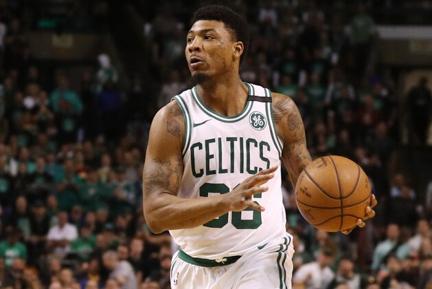BOSTON, MA - MAY 27: Marcus Smart #36 of the Boston Celtics dribbles against the Cleveland Cavaliers during Game Seven of the 2018 NBA Eastern Conference Finals  at TD Garden on May 27, 2018 in Boston, Massachusetts. (Photo by Maddie Meyer/Getty Images)