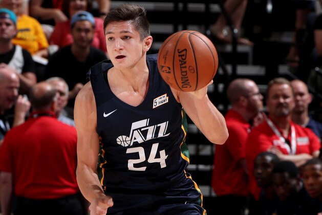 SALT LAKE CITY, UT - JULY 2:  Grayson Allen #24 of the Utah Jazz handles the ball during the game against the San Antonio Spurs during the 2018 Utah Jazz Summer League on July 2, 2018 at vivint.SmartHome Arena in Salt Lake City, Utah. NOTE TO USER: User expressly acknowledges and agrees that, by downloading and or using this Photograph, User is consenting to the terms and conditions of the Getty Images License Agreement. Mandatory Copyright Notice: Copyright 2018 NBAE (Photo by Joe Murphy/NBAE via Getty Images)