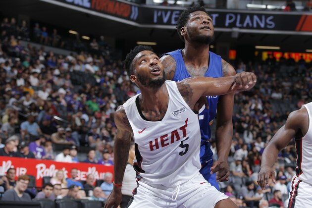 SACRAMENTO, CA - JULY 2:  Derrick Jones Jr. #5 of the Miami Heat boxes out the Golden State Warriors during the 2018 California Classic on July 2, 2018 at Golden 1 Center in Sacramento, California. NOTE TO USER: User expressly acknowledges and agrees that, by downloading and or using this Photograph, user is consenting to the terms and conditions of the Getty Images License Agreement. Mandatory Copyright Notice: Copyright 2018 NBAE (Photo by Rocky Widner/NBAE via Getty Images)