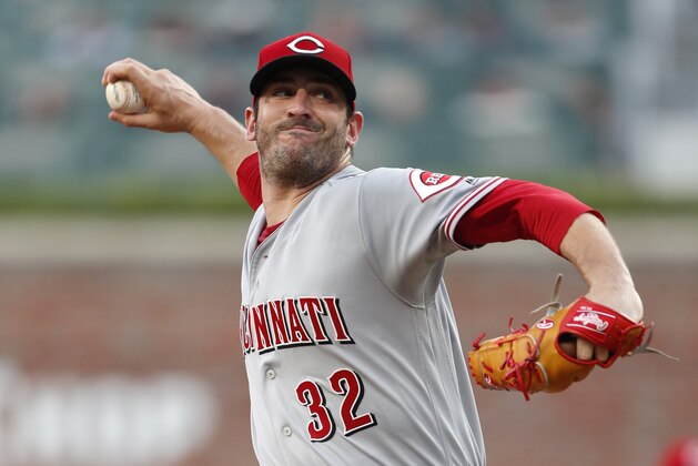 Cincinnati Reds starting pitcher Matt Harvey (32) works against the Atlanta Braves in the first inning of a baseball game Tuesday, June 26, 2018, in Atlanta. (AP Photo/John Bazemore)