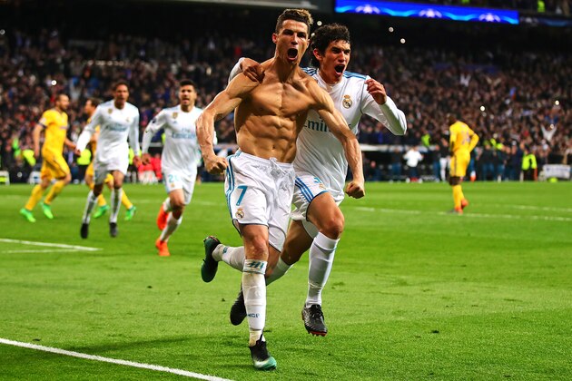 MADRID, SPAIN - APRIL 11: Cristiano Ronaldo of Real Madrid celebrates scoring his side's first goal during the UEFA Champions League Quarter Final, second leg match between Real Madrid and Juventus at Estadio Santiago Bernabeu on April 11, 2018 in Madrid, Spain. (Photo by Chris Brunskill Ltd/Getty Images)