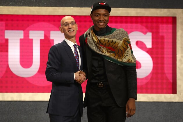 NEW YORK, NY - JUNE 21:  Wendell Carter Jr. poses with NBA Commissioner Adam Silver after being drafted seventh overall by the Chicago Bulls during the 2018 NBA Draft at the Barclays Center on June 21, 2018 in the Brooklyn borough of New York City. NOTE TO USER: User expressly acknowledges and agrees that, by downloading and or using this photograph, User is consenting to the terms and conditions of the Getty Images License Agreement.  (Photo by Mike Stobe/Getty Images)