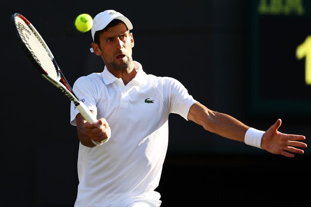 LONDON, ENGLAND - JULY 03: Novak Djokovic of Serbia returns against Tennys Sandgren of the United States during their Men's Singles first round match on day two of the Wimbledon Lawn Tennis Championships at All England Lawn Tennis and Croquet Club on July 3, 2018 in London, England.  (Photo by Michael Steele/Getty Images)