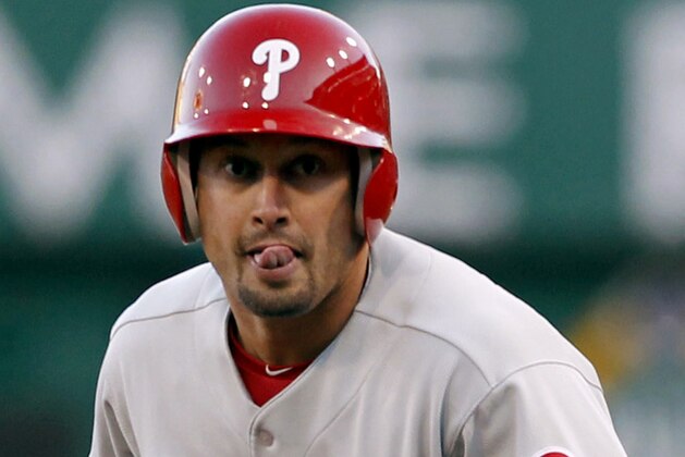 FILE - In this April 7, 2012, file photo, Philadelphia Phillies' Shane Victorino (8) watches the action during a baseball game against the Pittsburgh Pirates in Pittsburgh. The Associated Press takes a look at five players who could be switching uniforms as the 4 p.m. EST non-waiver trade deadline quickly approaches on July 31. (AP Photo/Keith Srakocic, File)