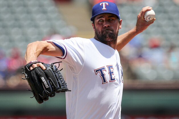 Texas Rangers starting pitcher Cole Hamels delivers against the Chicago White Sox in the first inning of a baseball game Sunday, July 1, 2018 in Arlington, TX. (AP Photo/ Richard W. Rodriguez)