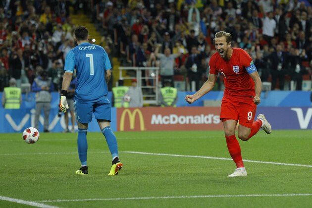 England's Harry Kane celebrates after scoring his side's first goal during the round of 16 match between Colombia and England at the 2018 soccer World Cup in the Spartak Stadium, in Moscow, Russia, Tuesday, July 3, 2018. (AP Photo/Victor R. Caivano)