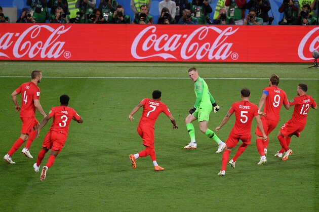 MOSCOW, RUSSIA - JULY 03:  Jordan Pickford of England is celebrated by team mates during penalty shoot out  during the 2018 FIFA World Cup Russia Round of 16 match between Colombia and England at Spartak Stadium on July 3, 2018 in Moscow, Russia.  (Photo by Laurence Griffiths/Getty Images)