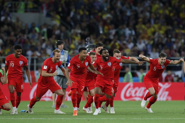 England's players celebrate after defeated Colombia in a penalty shoot out during the round of 16 match between Colombia and England at the 2018 soccer World Cup in the Spartak Stadium, in Moscow, Russia, Tuesday, July 3, 2018. (AP Photo/Ricardo Mazalan)