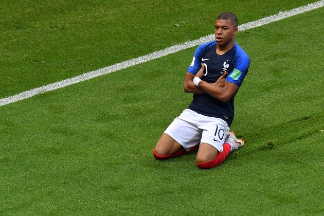 TOPSHOT - France's Kylian Mbappe celebrates after scoring his team's third goal during the Russia 2018 World Cup round of 16 football match between France and Argentina at the Kazan Arena in Kazan on June 30, 2018. (Photo by SAEED KHAN / AFP) / RESTRICTED TO EDITORIAL USE - NO MOBILE PUSH ALERTS/DOWNLOADS        (Photo credit should read SAEED KHAN/AFP/Getty Images)