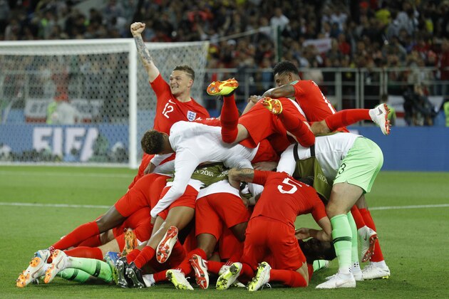 England players celebrate at the end of the round of 16 match between Colombia and England at the 2018 soccer World Cup in the Spartak Stadium, in Moscow, Russia, Tuesday, July 3, 2018. England won after a penalty shoot out. (AP Photo/Victor R. Caivano)