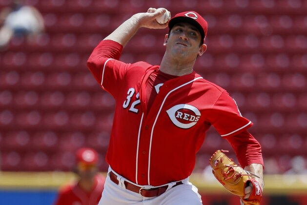 Cincinnati Reds starting pitcher Matt Harvey throws in the fourth inning of a baseball game against the Milwaukee Brewers, Sunday, July 1, 2018, in Cincinnati. (AP Photo/John Minchillo)
