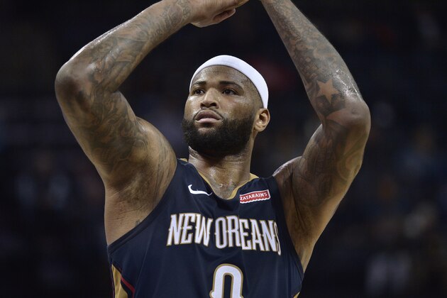 FILE - In this Jan. 10, 2018 file photo New Orleans Pelicans center DeMarcus Cousins (0) shoots a free throw in the first half of an NBA basketball game against the Memphis Grizzlies in Memphis, Tenn. Cousins will be ready to play at some point this season. And when he is, the two-time defending NBA champions will be waiting. Adding a fifth All-Star to their already glitzy lineup, the Golden State Warriors have come to terms with Cousins on a one-year, $5.3 million deal _ not the biggest money move on Day 2 of the NBA Free Agency period, but the most intriguing. (AP Photo/Brandon Dill, file)