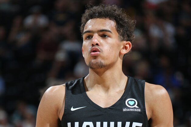SALT LAKE CITY, UT - JULY 2: Trae Young #11 of the Atlanta Hawks shoots a free throw against the Memphis Grizzlies during the 2018 Utah Summer League on July 2, 2018 at vivint.SmartHome Arena in Salt Lake City, Utah. NOTE TO USER: User expressly acknowledges and agrees that, by downloading and/or using this photograph, user is consenting to the terms and conditions of the Getty Images License Agreement. Mandatory Copyright Notice: Copyright 2018 NBAE (Photo by Melissa Majchrzak/NBAE via Getty Images)
