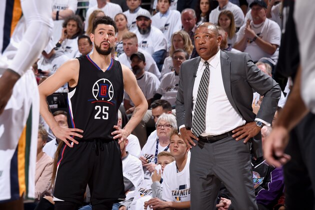 SALT LAKE CITY, UT - APRIL 28:  Austin Rivers #25 and Doc Rivers of the Los Angeles Clippers talk during the game against the Utah Jazz during Game Six of the Western Conference Quarterfinals of the 2017 NBA Playoffs on April 28, 2017 at vivint.SmartHome Arena in Salt Lake City, Utah. NOTE TO USER: User expressly acknowledges and agrees that, by downloading and/or using this Photograph, user is consenting to the terms and conditions of the Getty Images License Agreement. Mandatory Copyright Notice: Copyright 2017 NBAE (Photo by Andrew D. Bernstein/NBAE via Getty Images)