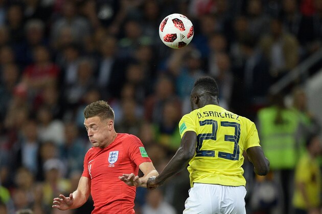 England's forward Jamie Vardy (L) vies with Colombia's defender Davinson Sanchez during the Russia 2018 World Cup round of 16 football match between Colombia and England at the Spartak Stadium in Moscow on July 3, 2018. (Photo by Juan Mabromata / AFP) / RESTRICTED TO EDITORIAL USE - NO MOBILE PUSH ALERTS/DOWNLOADS        (Photo credit should read JUAN MABROMATA/AFP/Getty Images)