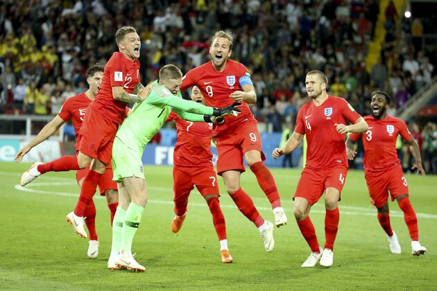 MOSCOW, RUSSIA - JULY 3: Goalkeeper of England Jordan Pickford is celebrated by teammates Kieran Trippier, Harry Kane, Eric Dier, Danny Rose of England after winning the penalty shootout of the 2018 FIFA World Cup Russia Round of 16 match between Colombia and England at Spartak Stadium on July 3, 2018 in Moscow, Russia. (Photo by Jean Catuffe/Getty Images)
