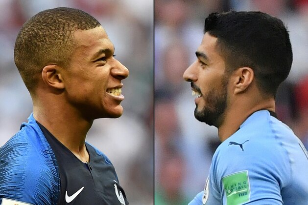 (COMBO) This combination of pictures created on July 03, 2018 shows France's forward Kylian Mbappe (L) in Kazan on June 30, 2018, and Uruguay's forward Luis Suarez (R) in Samara on June 25, 2018. - France will face Uruguay on July 6, 2018 in Nizhniy Novgorod for their quarter final match of the Russia 2018 World Cup football tournament. (Photos by FRANCK FIFE and EMMANUEL DUNAND / AFP) / RESTRICTED TO EDITORIAL USE - NO MOBILE PUSH ALERTS/DOWNLOADS
RESTRICTED TO EDITORIAL USE - NO MOBILE PUSH ALERTS/DOWNLOADS        (Photo credit should read FRANCK FIFE,EMMANUEL DUNAND/AFP/Getty Images)