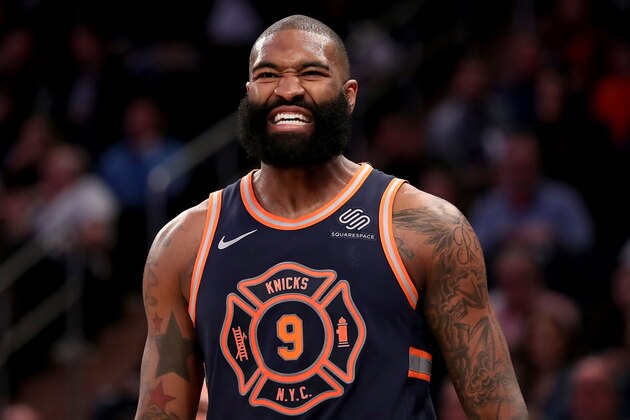NEW YORK, NY - MARCH 31: Kyle O'Quinn #9 of the New York Knicks reacts in the third quarter against the Detroit Pistons during their game at Madison Square Garden on March 31, 2018 in New York City. NOTE TO USER: User expressly acknowledges and agrees that, by downloading and or using this photograph, User is consenting to the terms and conditions of the Getty Images License Agreement. (Photo by Abbie Parr/Getty Images)