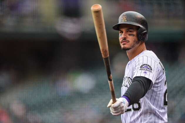 DENVER, CO - JUNE 24: Nolan Arenado #28 of the Colorado Rockies prepares to bat against the Miami Marlins int he first inning of a game at Coors Field on June 24, 2018 in Denver, Colorado.  (Photo by Dustin Bradford/Getty Images)
