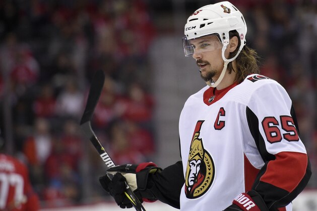 Ottawa Senators defenseman Erik Karlsson (65), of Sweden, looks on during the first period of an NHL hockey game against the Washington Capitals, Wednesday, Nov. 22, 2017, in Washington. (AP Photo/Nick Wass)