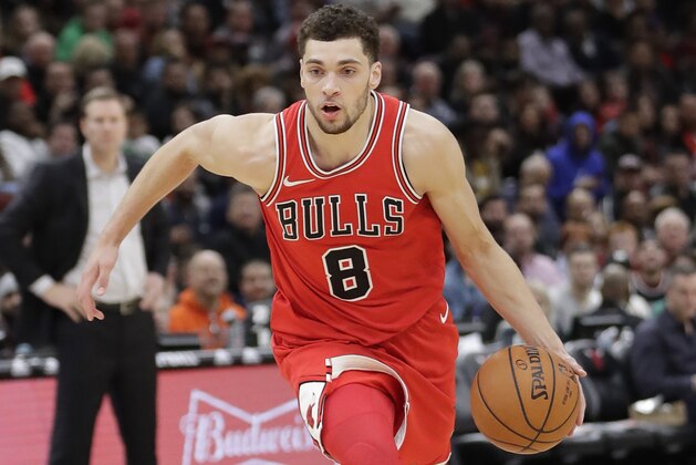 Chicago Bulls' Zach LaVine drives to the basket during the second half of an NBA basketball game against the Philadelphia 76ers Thursday, Feb. 22, 2018, in Chicago. The 76ers won 116-115. (AP Photo/Charles Rex Arbogast)