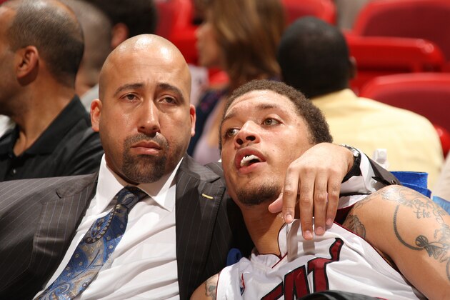 MIAMI - MARCH 4:  Michael Beasley #30 of the Miami Heat takes a breather with assistant coach David Fizdale on March 4, 2009 at the American Airlines Arena in Miami, Florida. NOTE TO USER: User expressly acknowledges and agrees that, by downloading and or using this Photograph, user is consenting to the terms and conditions of the Getty Images License Agreement. Mandatory Copyright Notice: Copyright 2009 NBAE (Photo by Victor Baldizon/NBAE via Getty Images)