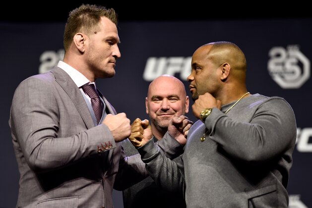 BROOKLYN, NEW YORK - APRIL 06:   (L-R) Opponents Stipe Miocic and Daniel Cormier face off during the UFC press conference inside Barclays Center on April 6, 2018 in Brooklyn, New York. (Photo by Jeff Bottari/Zuffa LLC/Zuffa LLC via Getty Images)