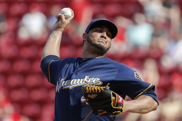 Milwaukee Brewers starting pitcher Jhoulys Chacin throws in the fourth inning of a baseball game against the Cincinnati Reds, Saturday, June 30, 2018, in Cincinnati. (AP Photo/John Minchillo)