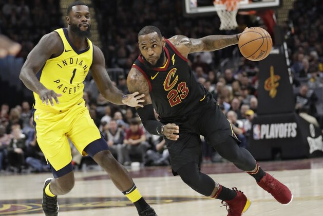 FILE - In this April 29, 2018, file photo, Cleveland Cavaliers' LeBron James (23) drives against Indiana Pacers' Lance Stephenson (1) in the first half of Game 7 of an NBA basketball first-round playoff series, Sunday, April 29, 2018, in Cleveland. The appeal for James to stay home is different now than it was eight years ago when he bolted for Miami. He’s more matured, and with three children and a burgeoning business empire, his priorities, responsibilities and goals are different. (AP Photo/Tony Dejak, File)