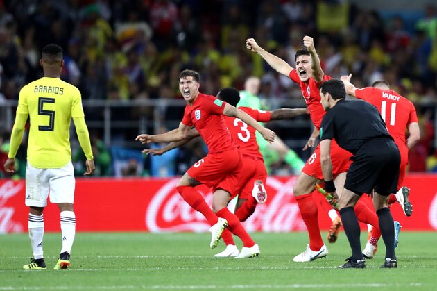 MOSCOW, RUSSIA - JULY 03:  John Stones, ang3a and Harry Maguire of England celebrate victory during the 2018 FIFA World Cup Russia Round of 16 match between Colombia and England at Spartak Stadium on July 3, 2018 in Moscow, Russia.  (Photo by Ryan Pierse/Getty Images)