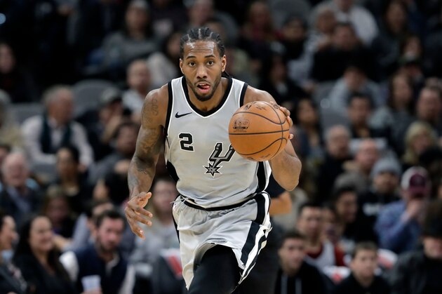 FILE - In this Jan. 13, 2018, file photo, San Antonio Spurs forward Kawhi Leonard (2) moves the ball up court during the second half of an NBA basketball game against the Denver Nuggets, in San Antonio. The absolute unwillingness to answer certain questions is part of the San Antonio Spurs' mystique. The Spurs just don't share much. So there is some unmistakable irony here that when it comes to the obviously fractured relationship between San Antonio and Kawhi Leonard, it's the Spurs who are the ones frustrated by the lack of answers. (AP Photo/Eric Gay, File)