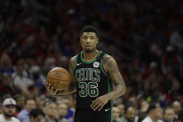 Boston Celtics' Marcus Smart in action during Game 4 of an NBA basketball second-round playoff series against the Philadelphia 76ers, Monday, May 7, 2018, in Philadelphia. (AP Photo/Matt Slocum)