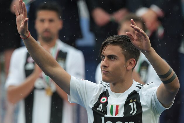 TURIN, ITALY - MAY 19: Paulo Dybala of Juventus FC greets the fans at the end of the serie A match between Juventus and Hellas Verona FC at Allianz Stadium on May 19, 2018 in Turin, Italy.  (Photo by Emilio Andreoli/Getty Images)