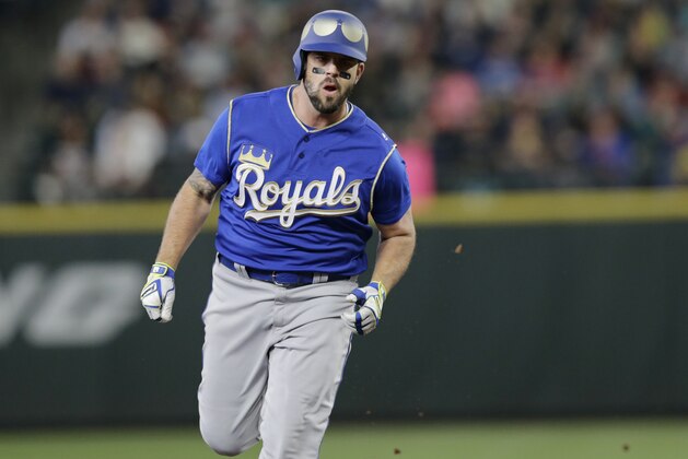 Kansas City Royals' Mike Moustakas rounds the bases after hitting a home run against the Seattle Mariners during a baseball game, Saturday, June 30, 2018, in Seattle. (AP Photo/John Froschauer)