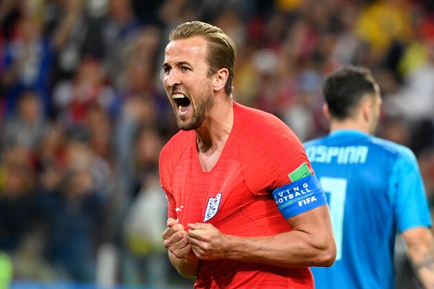 TOPSHOT - England's forward Harry Kane celebrates after scoring the opening goal from the penalty spot during the Russia 2018 World Cup round of 16 football match between Colombia and England at the Spartak Stadium in Moscow on July 3, 2018. (Photo by Alexander NEMENOV / AFP) / RESTRICTED TO EDITORIAL USE - NO MOBILE PUSH ALERTS/DOWNLOADS        (Photo credit should read ALEXANDER NEMENOV/AFP/Getty Images)