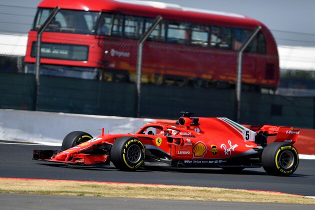 Ferrari's German driver Sebastian Vettel drives during first practice at Silverstone motor racing circuit in Silverstone, central England, on July 6, 2018 ahead of the British Formula One Grand Prix. (Photo by Andrej ISAKOVIC / AFP)        (Photo credit should read ANDREJ ISAKOVIC/AFP/Getty Images)